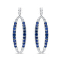 View details for 18K White Gold 1.11 Cttw Blue Round Diamond and Blue Sapphire Openwork Oval Shaped Dangle Earrings (F-G Color, VS1-VS2 Clarity) 18K White Gold 1.11 Cttw Blue Round Diamond and Blue Sapphire Openwork Oval Shaped Dangle Earrings (F-G Color,