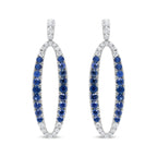 View details for 18K White Gold 1.11 Cttw Blue Round Diamond and Blue Sapphire Openwork Oval Shaped Dangle Earrings (F-G Color, VS1-VS2 Clarity) 18K White Gold 1.11 Cttw Blue Round Diamond and Blue Sapphire Openwork Oval Shaped Dangle Earrings (F-G Color,