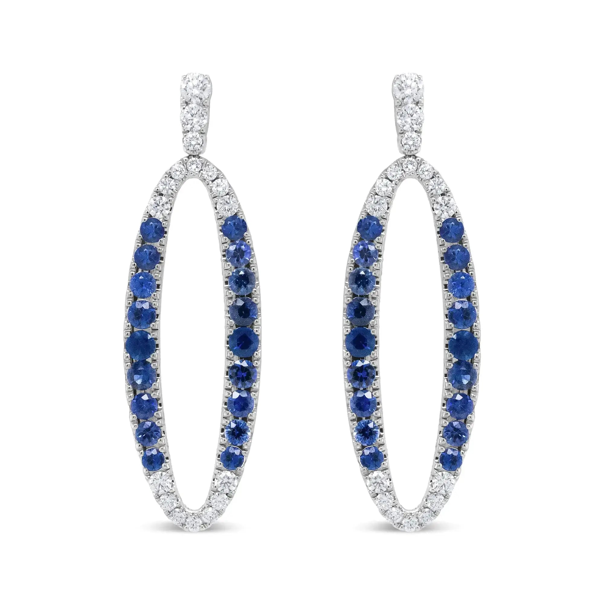 View details for 18K White Gold 1.11 Cttw Blue Round Diamond and Blue Sapphire Openwork Oval Shaped Dangle Earrings (F-G Color, VS1-VS2 Clarity) 18K White Gold 1.11 Cttw Blue Round Diamond and Blue Sapphire Openwork Oval Shaped Dangle Earrings (F-G Color,