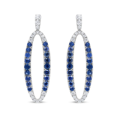 View details for 18K White Gold 1.11 Cttw Blue Round Diamond and Blue Sapphire Openwork Oval Shaped Dangle Earrings (F-G Color, VS1-VS2 Clarity) 18K White Gold 1.11 Cttw Blue Round Diamond and Blue Sapphire Openwork Oval Shaped Dangle Earrings (F-G Color,