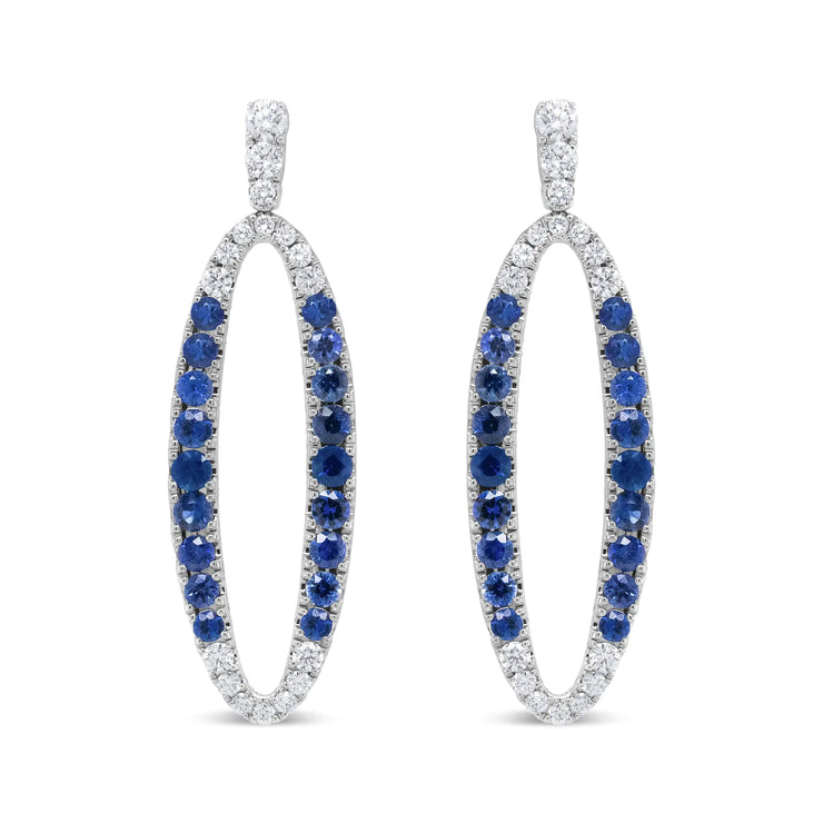 View details for 18K White Gold 1.11 Cttw Blue Round Diamond and Blue Sapphire Openwork Oval Shaped Dangle Earrings (F-G Color, VS1-VS2 Clarity) 18K White Gold 1.11 Cttw Blue Round Diamond and Blue Sapphire Openwork Oval Shaped Dangle Earrings (F-G Color,