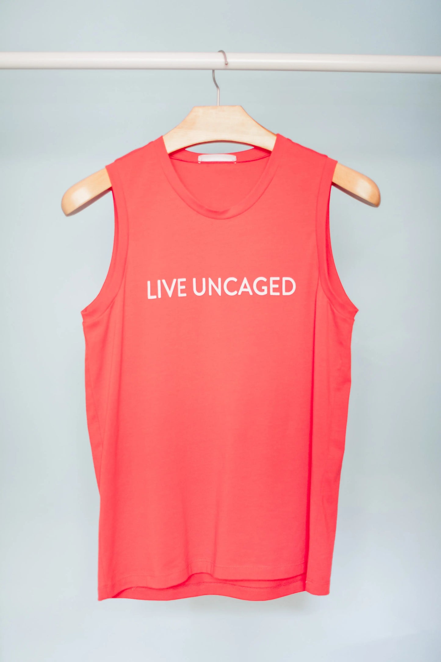 LIVE UNCAGED Tank Salmon Bella
