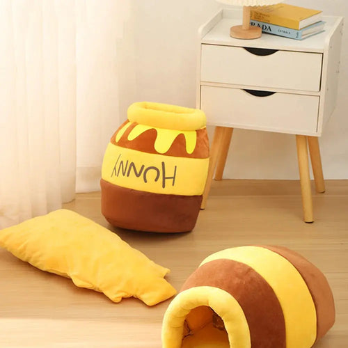 Adorable cama para gatos con diseño de tarro de miel