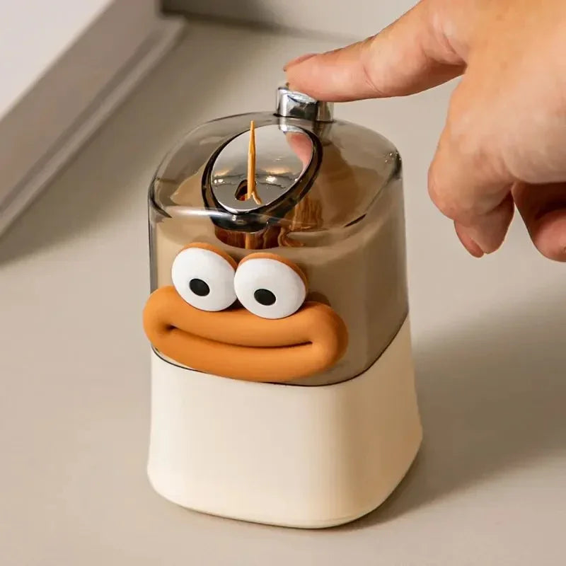 Automatic pop-up of toothpick