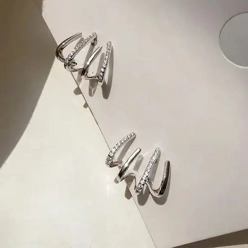 2024 premium light luxury four claw row earrings design sense