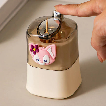 Automatic pop-up of toothpick