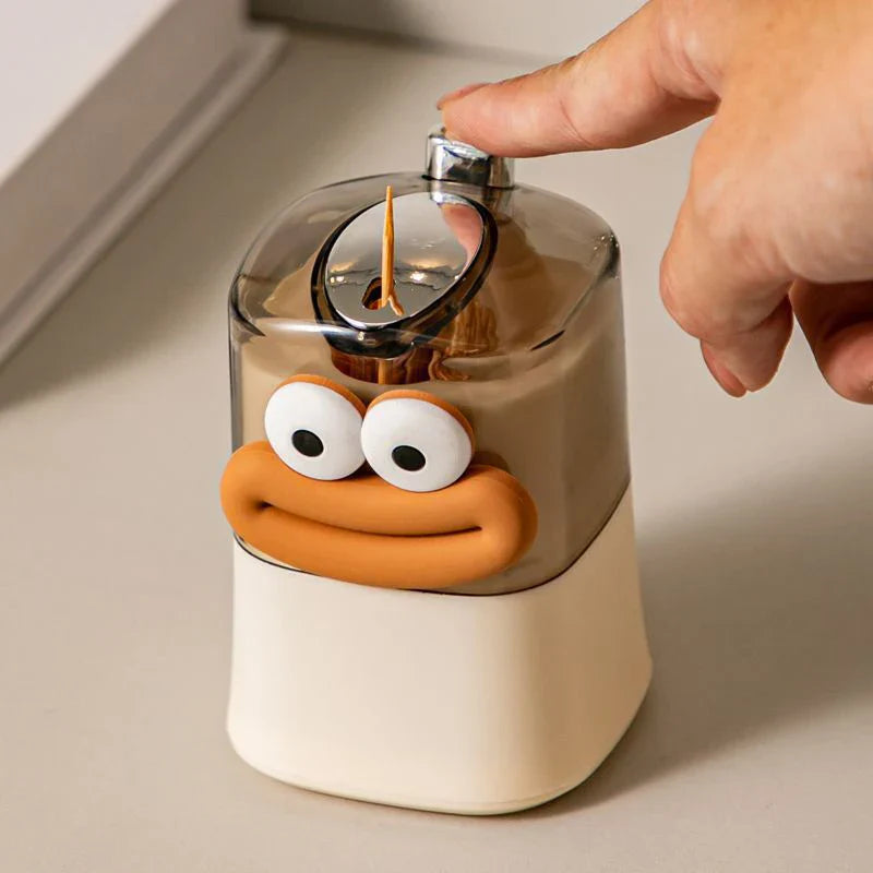 Automatic pop-up of toothpick
