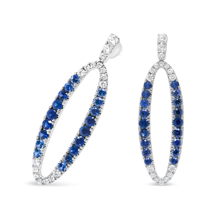 View details for 18K White Gold 1.11 Cttw Blue Round Diamond and Blue Sapphire Openwork Oval Shaped Dangle Earrings (F-G Color, VS1-VS2 Clarity)