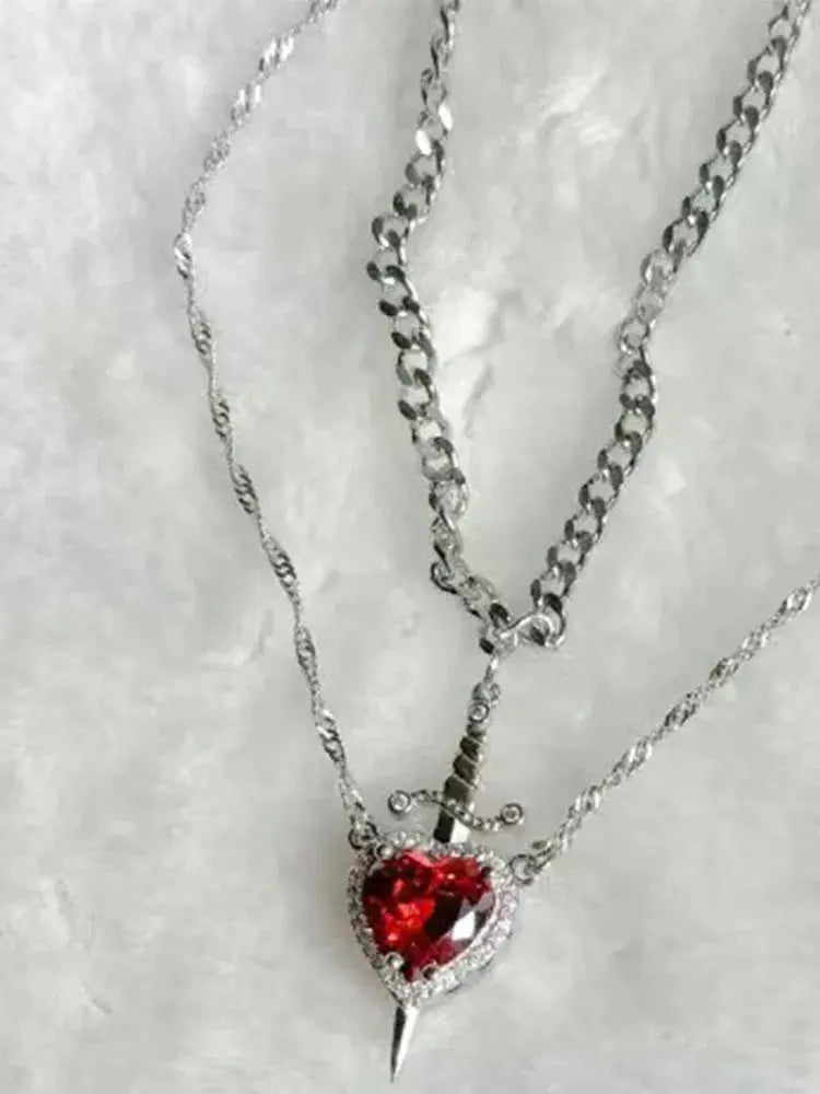 Conjunto de Colgante y Anillo Corazón y Espada de Cristal